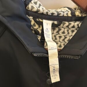 Lululemon Black Jacket with Patterned Lining Rain Jacket